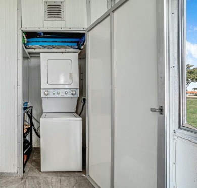 Welcome to this beautifully updated corner unit on 1st-floor on Kings Point Golf - Executive in Florida - for sale on GolfHomes.com, golf home, golf lot