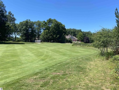 Possibly the most desirable lot at the end of the cul de sac in on Manitou Passage Golf Club in Michigan - for sale on GolfHomes.com, golf home, golf lot