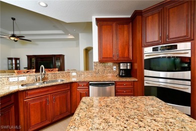 You must see this elegantly appointed home with its open floor on Estero Country Club in Florida - for sale on GolfHomes.com, golf home, golf lot