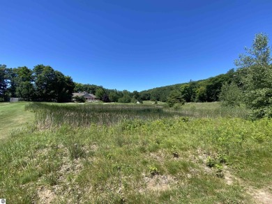 Possibly the most desirable lot at the end of the cul de sac in on Manitou Passage Golf Club in Michigan - for sale on GolfHomes.com, golf home, golf lot