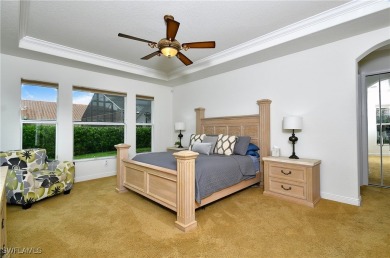 You must see this elegantly appointed home with its open floor on Estero Country Club in Florida - for sale on GolfHomes.com, golf home, golf lot