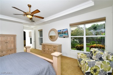 You must see this elegantly appointed home with its open floor on Estero Country Club in Florida - for sale on GolfHomes.com, golf home, golf lot