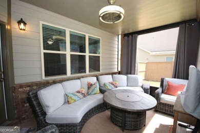 Enter this tranquil retreat that exudes a quiet elegance.  Step on Berkeley Hills Country Club in Georgia - for sale on GolfHomes.com, golf home, golf lot