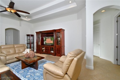 You must see this elegantly appointed home with its open floor on Estero Country Club in Florida - for sale on GolfHomes.com, golf home, golf lot