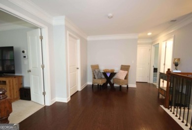 Enter this tranquil retreat that exudes a quiet elegance.  Step on Berkeley Hills Country Club in Georgia - for sale on GolfHomes.com, golf home, golf lot
