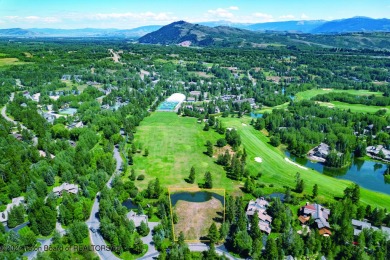 This spectacular .82 acre parcel, one of the original Estate on Teton Pines Golf Club in Wyoming - for sale on GolfHomes.com, golf home, golf lot