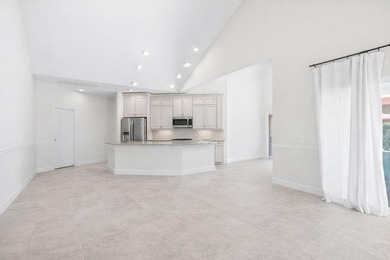 PRICE REDUCTION-- Bring your paint brush and move into this on  in Florida - for sale on GolfHomes.com, golf home, golf lot