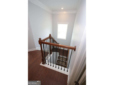 Enter this tranquil retreat that exudes a quiet elegance.  Step on Berkeley Hills Country Club in Georgia - for sale on GolfHomes.com, golf home, golf lot