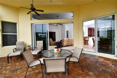 You must see this elegantly appointed home with its open floor on Estero Country Club in Florida - for sale on GolfHomes.com, golf home, golf lot