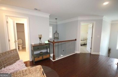 Enter this tranquil retreat that exudes a quiet elegance.  Step on Berkeley Hills Country Club in Georgia - for sale on GolfHomes.com, golf home, golf lot