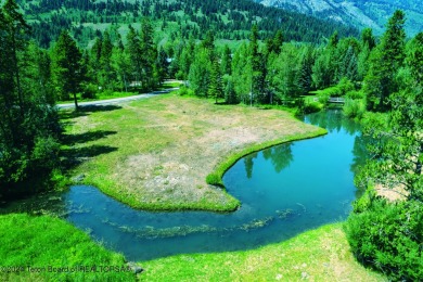 This spectacular .82 acre parcel, one of the original Estate on Teton Pines Golf Club in Wyoming - for sale on GolfHomes.com, golf home, golf lot