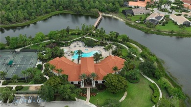 You must see this elegantly appointed home with its open floor on Estero Country Club in Florida - for sale on GolfHomes.com, golf home, golf lot
