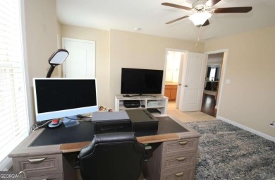 Enter this tranquil retreat that exudes a quiet elegance.  Step on Berkeley Hills Country Club in Georgia - for sale on GolfHomes.com, golf home, golf lot