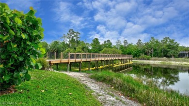 You must see this elegantly appointed home with its open floor on Estero Country Club in Florida - for sale on GolfHomes.com, golf home, golf lot