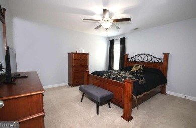 Enter this tranquil retreat that exudes a quiet elegance.  Step on Berkeley Hills Country Club in Georgia - for sale on GolfHomes.com, golf home, golf lot
