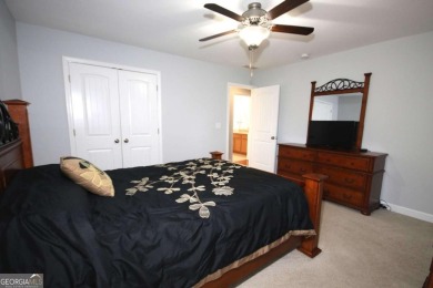 Enter this tranquil retreat that exudes a quiet elegance.  Step on Berkeley Hills Country Club in Georgia - for sale on GolfHomes.com, golf home, golf lot