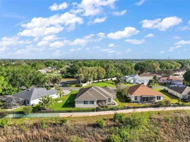 BOND PAID! BREATHTAKING PRESERVE VIEWS - A SERENE AND on Tierra Del Sol Golf and Country Club in Florida - for sale on GolfHomes.com, golf home, golf lot