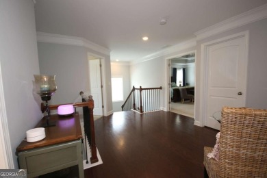 Enter this tranquil retreat that exudes a quiet elegance.  Step on Berkeley Hills Country Club in Georgia - for sale on GolfHomes.com, golf home, golf lot