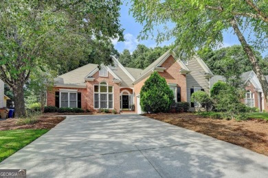 Welcome to a home that blends warmth, comfort, and community in on Hamilton Mill Golf Club in Georgia - for sale on GolfHomes.com, golf home, golf lot