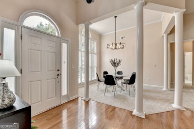 Welcome to a home that blends warmth, comfort, and community in on Hamilton Mill Golf Club in Georgia - for sale on GolfHomes.com, golf home, golf lot