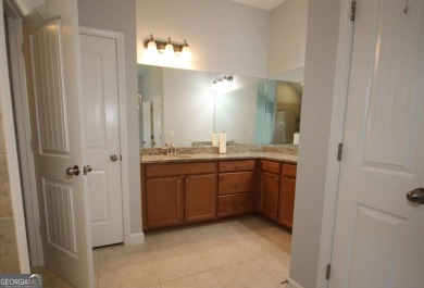 Enter this tranquil retreat that exudes a quiet elegance.  Step on Berkeley Hills Country Club in Georgia - for sale on GolfHomes.com, golf home, golf lot