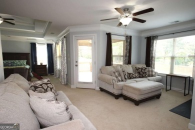 Enter this tranquil retreat that exudes a quiet elegance.  Step on Berkeley Hills Country Club in Georgia - for sale on GolfHomes.com, golf home, golf lot