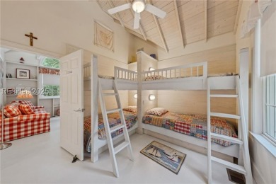 Tucked away on a private, oversized lot in Shipyard, this on Shipyard Golf Club in South Carolina - for sale on GolfHomes.com, golf home, golf lot