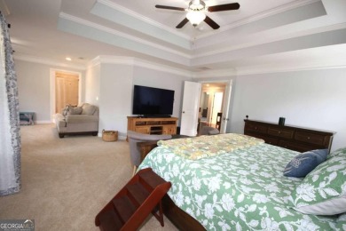Enter this tranquil retreat that exudes a quiet elegance.  Step on Berkeley Hills Country Club in Georgia - for sale on GolfHomes.com, golf home, golf lot