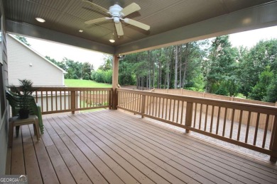 Enter this tranquil retreat that exudes a quiet elegance.  Step on Berkeley Hills Country Club in Georgia - for sale on GolfHomes.com, golf home, golf lot