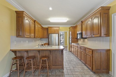 Hard to find ! Check out this 4-bedroom, 2.5-bath home close to on Centennial Valley Golf Course in Arkansas - for sale on GolfHomes.com, golf home, golf lot