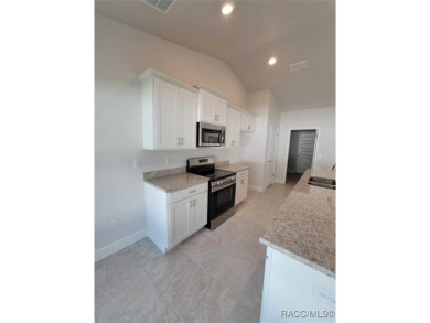 THIS HOME QUALIFIES FOR A LOW INTEREST RATE BUYDOWN WHEN BUYER on Citrus Springs Country Club in Florida - for sale on GolfHomes.com, golf home, golf lot