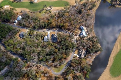 Nice wooded homesite in this gated golf course on The Golf Club At Sanctuary Cove in Georgia - for sale on GolfHomes.com, golf home, golf lot
