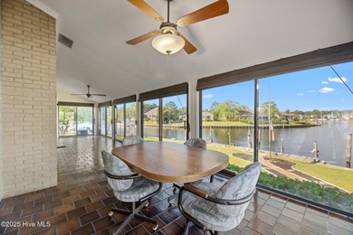 Experience unparalleled waterfront living in this waterfront on Harbour Point Golf Club in North Carolina - for sale on GolfHomes.com, golf home, golf lot