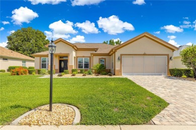 Beautifully updated and modified Granville model boasts on Eagle Ridge At Spruce Creek Country Club in Florida - for sale on GolfHomes.com, golf home, golf lot