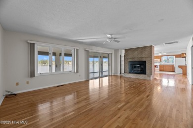 Experience unparalleled waterfront living in this waterfront on Harbour Point Golf Club in North Carolina - for sale on GolfHomes.com, golf home, golf lot