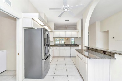 New Improved Price**  Located on the first tee, this home is on Royal Oaks Golf Club in Florida - for sale on GolfHomes.com, golf home, golf lot