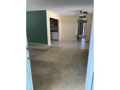 This corner unit in Kings Point, Delray Beach, offers a bright on Kings Point Golf -Flanders Way in Florida - for sale on GolfHomes.com, golf home, golf lot