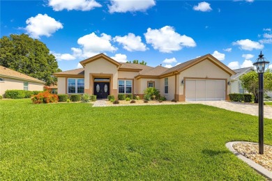 Beautifully updated and modified Granville model boasts on Eagle Ridge At Spruce Creek Country Club in Florida - for sale on GolfHomes.com, golf home, golf lot