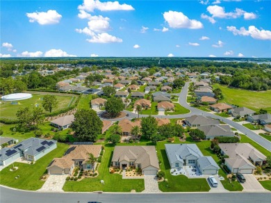 Beautifully updated and modified Granville model boasts on Eagle Ridge At Spruce Creek Country Club in Florida - for sale on GolfHomes.com, golf home, golf lot