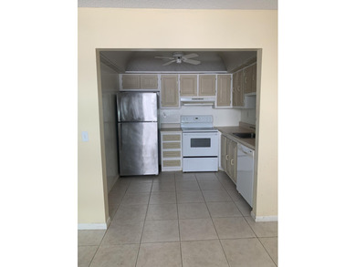 This corner unit in Kings Point, Delray Beach, offers a bright on Kings Point Golf -Flanders Way in Florida - for sale on GolfHomes.com, golf home, golf lot