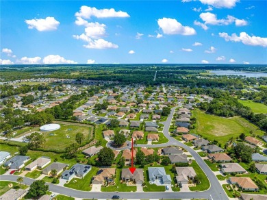 Beautifully updated and modified Granville model boasts on Eagle Ridge At Spruce Creek Country Club in Florida - for sale on GolfHomes.com, golf home, golf lot
