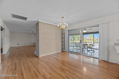 Experience unparalleled waterfront living in this waterfront on Harbour Point Golf Club in North Carolina - for sale on GolfHomes.com, golf home, golf lot