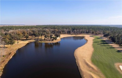 Nice wooded homesite in this gated golf course on The Golf Club At Sanctuary Cove in Georgia - for sale on GolfHomes.com, golf home, golf lot