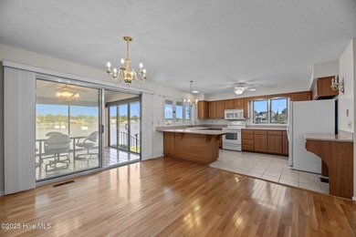 Experience unparalleled waterfront living in this waterfront on Harbour Point Golf Club in North Carolina - for sale on GolfHomes.com, golf home, golf lot