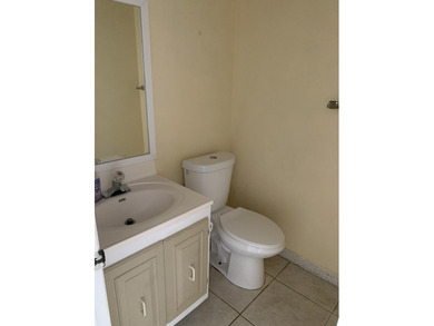 This corner unit in Kings Point, Delray Beach, offers a bright on Kings Point Golf -Flanders Way in Florida - for sale on GolfHomes.com, golf home, golf lot