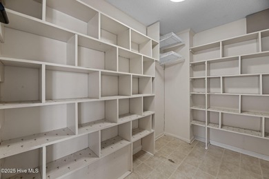 Experience unparalleled waterfront living in this waterfront on Harbour Point Golf Club in North Carolina - for sale on GolfHomes.com, golf home, golf lot