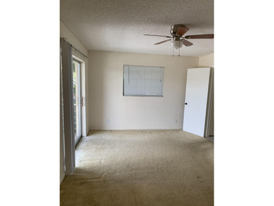 This corner unit in Kings Point, Delray Beach, offers a bright on Kings Point Golf -Flanders Way in Florida - for sale on GolfHomes.com, golf home, golf lot