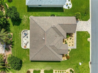 Beautifully updated and modified Granville model boasts on Eagle Ridge At Spruce Creek Country Club in Florida - for sale on GolfHomes.com, golf home, golf lot