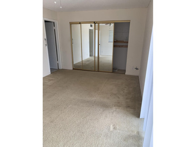 This corner unit in Kings Point, Delray Beach, offers a bright on Kings Point Golf -Flanders Way in Florida - for sale on GolfHomes.com, golf home, golf lot