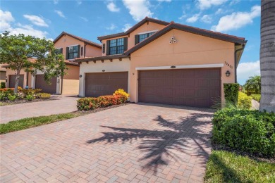 Stunning Ground-Floor Condo with Water Views in Sarasota on Sarasota National Golf Club in Florida - for sale on GolfHomes.com, golf home, golf lot